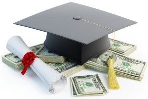 graduation cap and dollar bills